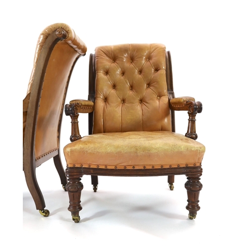 222 - A pair of early Victorian mahogany open armchairs, with moulded frames and brown leather upholstery,... 