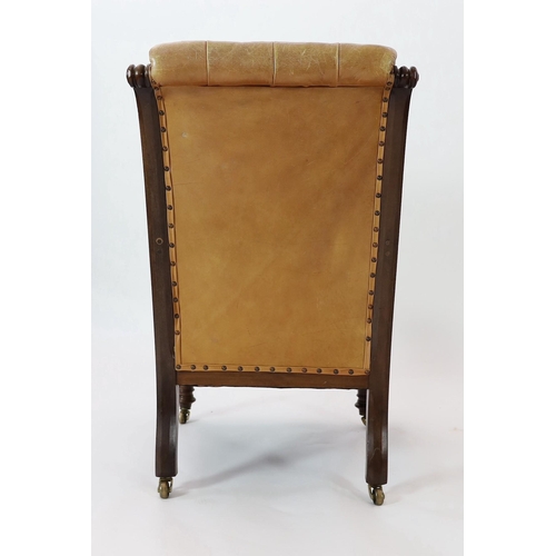 222 - A pair of early Victorian mahogany open armchairs, with moulded frames and brown leather upholstery,... 