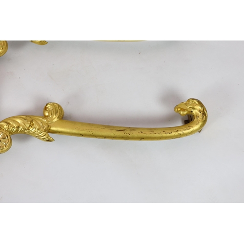 223 - A pair of mid 19th century giltwood pediments, of laurel wreath ribbon and scroll form with eagles h... 