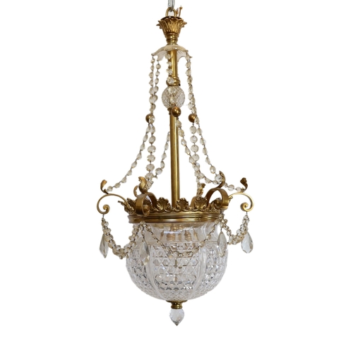 231 -  A late Victorian ormolu and cut glass light fitting, by F & C Osler, with glass swagged stem, scrol... 