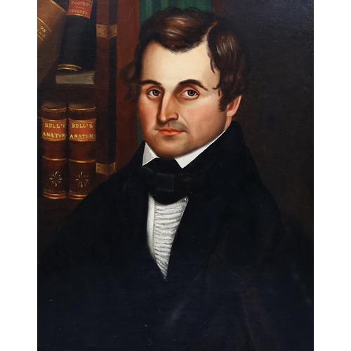 256 - 19th century American School Portrait of Charles Burgess, seated beside a copy of bells anatomy and ... 