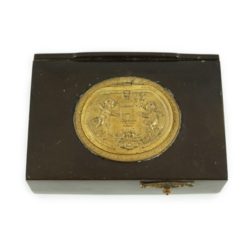 26 - A late 19th century Swiss gilt metal mounted phenolic singing bird box, the lid decorated in relief ... 