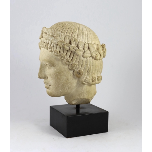 30 - After the Roman Antique, limestone head of a woman wearing a laurel wreath diadem, possibly 18th/19t... 