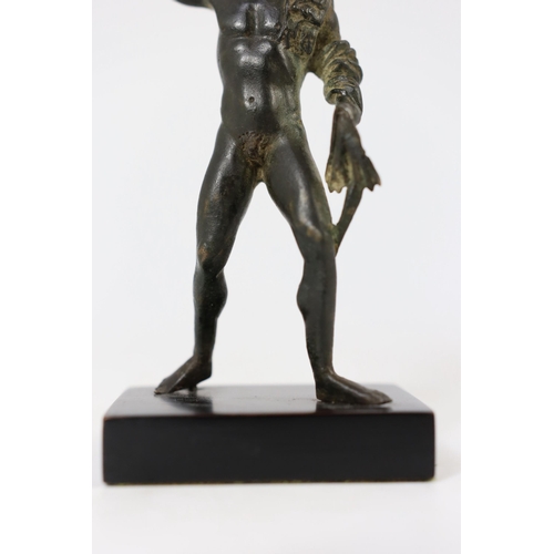 33 - A small Roman bronze figure of Hercules, 1st century AD, The figure lacking his right arm.Provenance... 