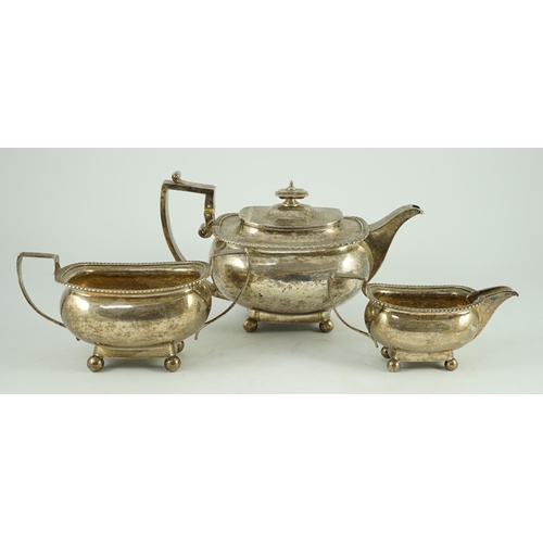 348 - A George III silver three piece 'London' shape tea service, by Samuel Hennell, London, 1811, gross 4... 