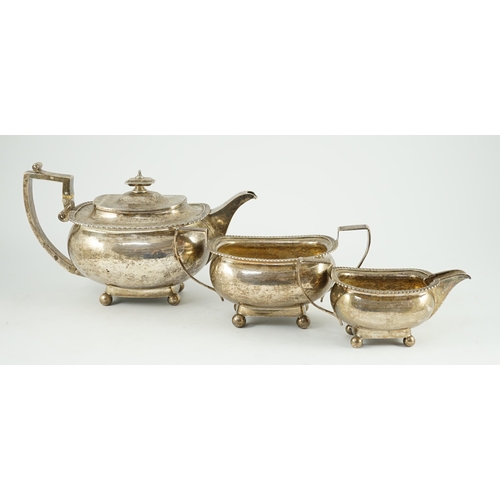 348 - A George III silver three piece 'London' shape tea service, by Samuel Hennell, London, 1811, gross 4... 