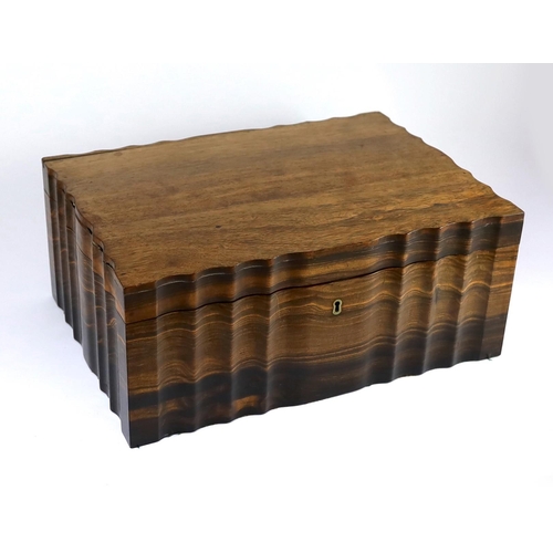 35 - A mid 19th century Anglo Indian ivory inset ebony and other exotic hardwood travelling casket, of se... 