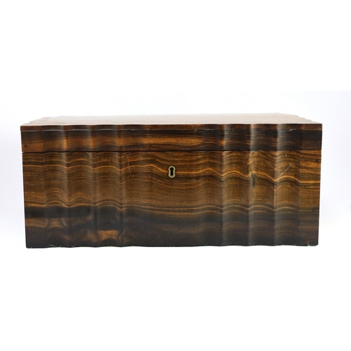 35 - A mid 19th century Anglo Indian ivory inset ebony and other exotic hardwood travelling casket, of se... 