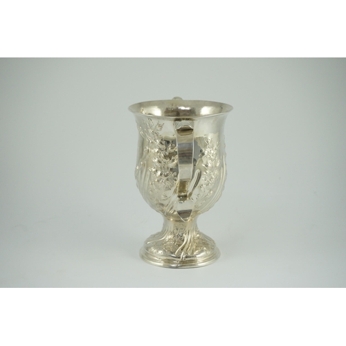 351 - A George III silver baluster two handled pedestal cup, with later embossed decoration, by John Scofi... 