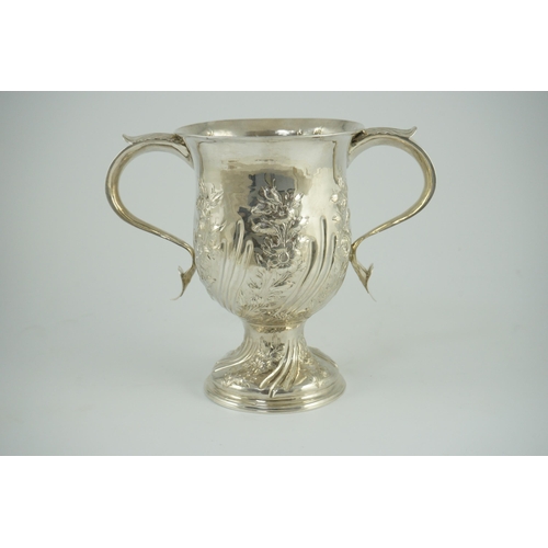 351 - A George III silver baluster two handled pedestal cup, with later embossed decoration, by John Scofi... 