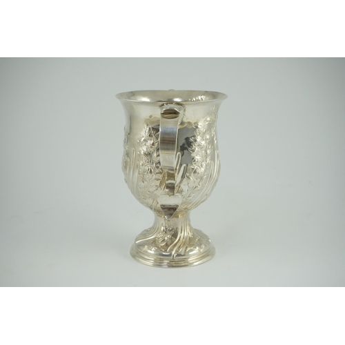 351 - A George III silver baluster two handled pedestal cup, with later embossed decoration, by John Scofi... 