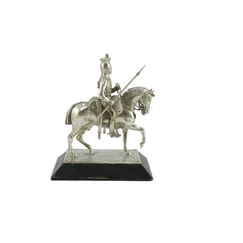 359 - An early 20th century miniature model of a Royal Lancer on horseback, by The Goldsmiths and Silversm... 