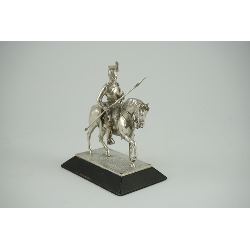 359 - An early 20th century miniature model of a Royal Lancer on horseback, by The Goldsmiths and Silversm... 