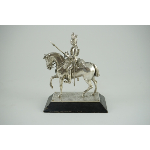 359 - An early 20th century miniature model of a Royal Lancer on horseback, by The Goldsmiths and Silversm... 