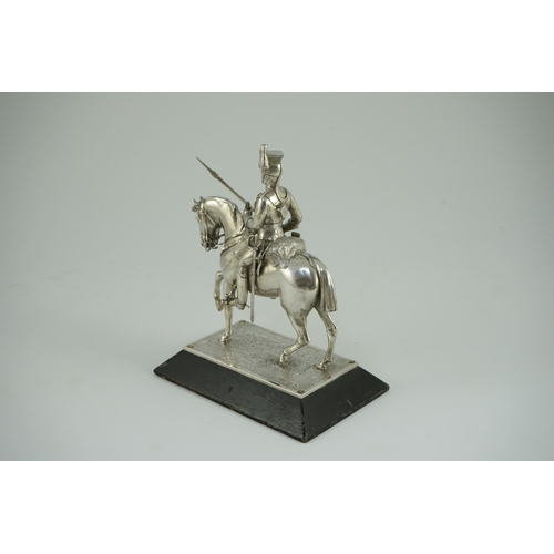 359 - An early 20th century miniature model of a Royal Lancer on horseback, by The Goldsmiths and Silversm... 