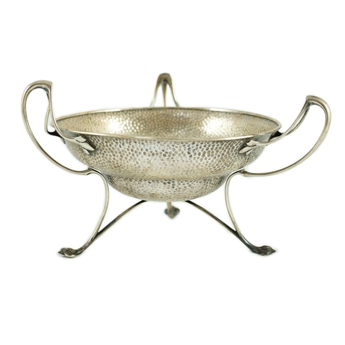 360 - An Edwardian Art Nouveau planished silver tri-handled bowl by The Alexander Clark Manufacturing Co.,... 