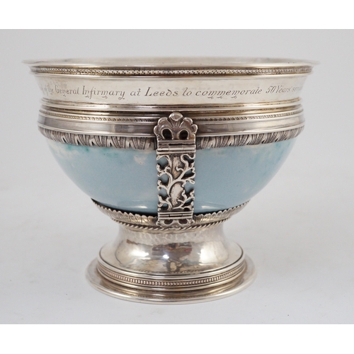 366 - An Arts and Crafts silver mounted Ruskin pottery pedestal bowl, the silver mounts by A.E. Jones, Bir... 