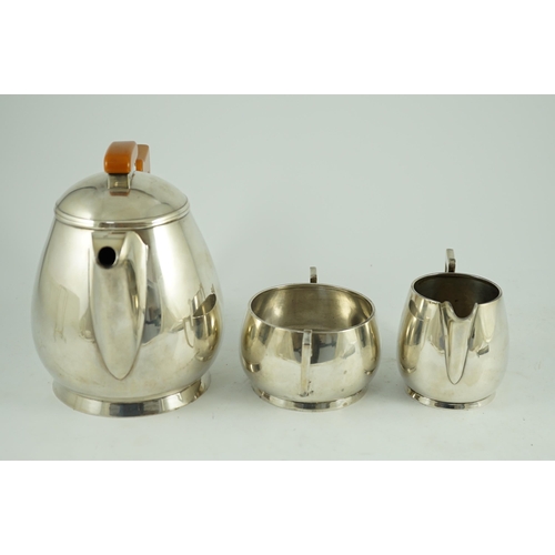 371 - A stylish George VI silver three piece tea set, by Ls Sl, with bakelite handles, London, 1947, gross... 