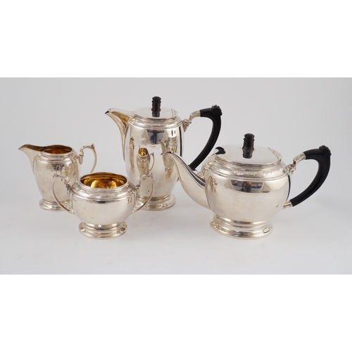 372 - A George VI four piece silver tea set, by Harrods Ltd, of circular and ovoid form, Sheffield, 1937, ... 