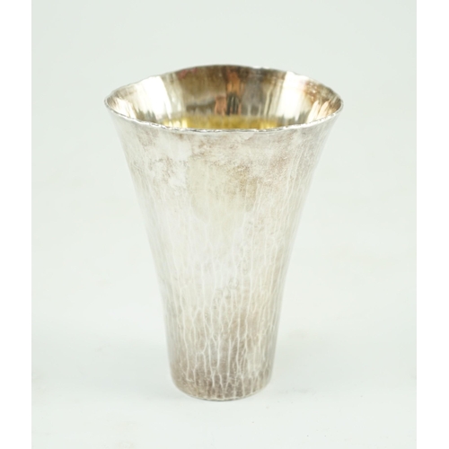 374 - A modern Britannia standard planished silver cup, by Malcolm Appleby, of flared form, with undulatin... 