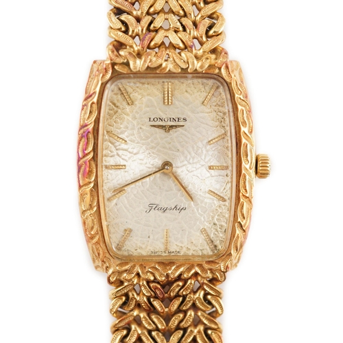 381 - A gentleman's 1980's 18ct gold Longines Flagship manual wind tonneau shaped dress wrist watch, with ... 