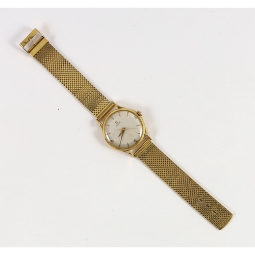 382 - A gentleman's 1950's 18ct gold Omega Automatic wrist watch, with French 18ct gold mark, on an associ... 