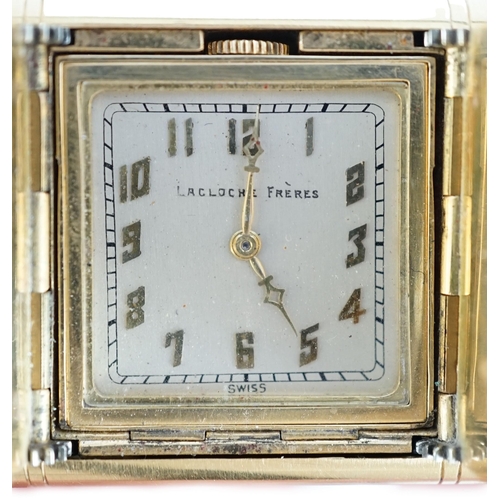 384 - A French Lacloche Freres 18ct gold mounted travelling watch, of rectangular form, with Arabic dial a... 