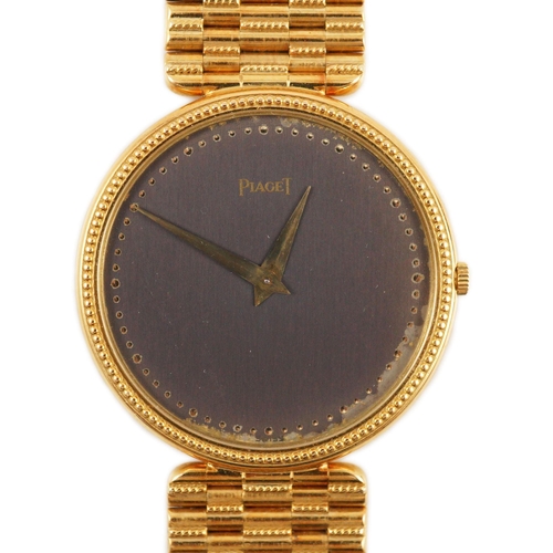 387 - A gentleman's 18ct gold Piaget manual wind dress wrist watch, on an 18ct  gold Piaget bracelet, the ... 