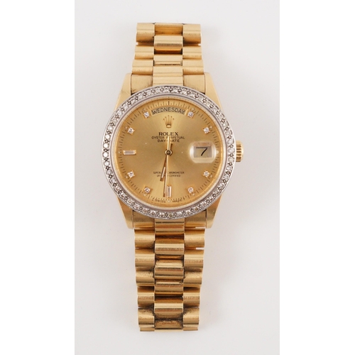 390 - A gentleman's 1980's 18ct gold and diamond set Rolex Oyster Perpetual Day-Date wrist watch, with dia... 