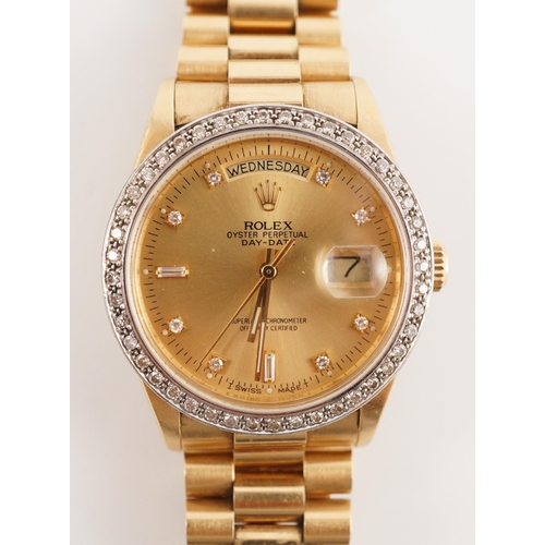 390 - A gentleman's 1980's 18ct gold and diamond set Rolex Oyster Perpetual Day-Date wrist watch, with dia... 