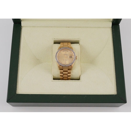 390 - A gentleman's 1980's 18ct gold and diamond set Rolex Oyster Perpetual Day-Date wrist watch, with dia... 