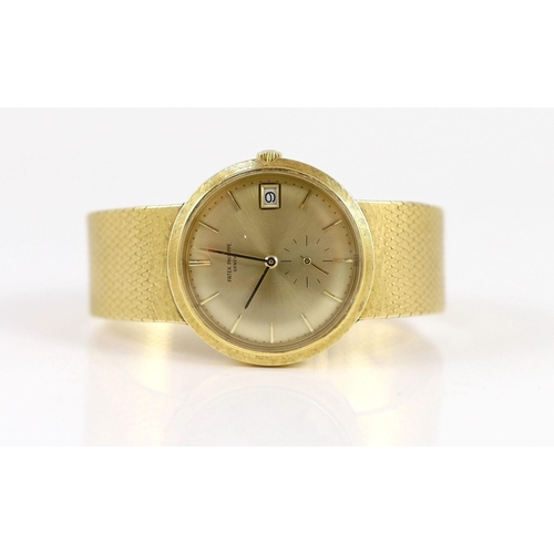 391 - A gentleman's late 20th century 18ct gold Patek Philippe automatic dress wrist watch, on integral Pa... 