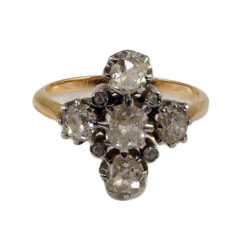 396 - A gold and old cut five stone diamond set 'cross' ring, with diamond chip set spacers, size O, gross... 