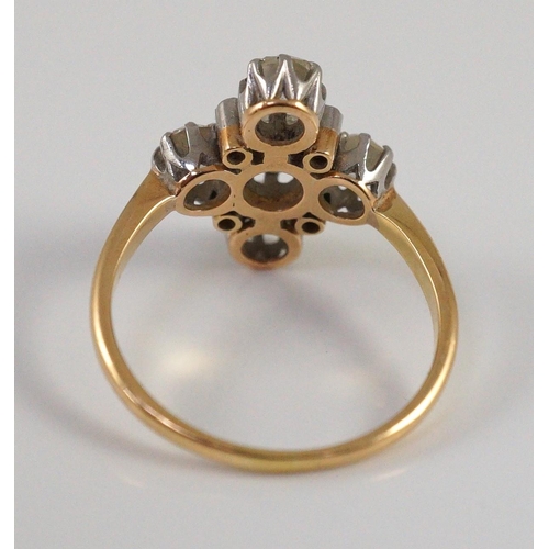 396 - A gold and old cut five stone diamond set 'cross' ring, with diamond chip set spacers, size O, gross... 