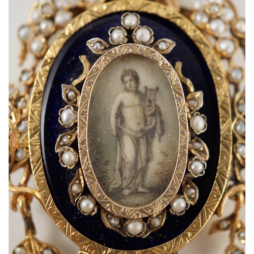 401 - A Regency parcel gilt silver seed pearl and enamel set oval pendant, with inset ivory panel of a sem... 