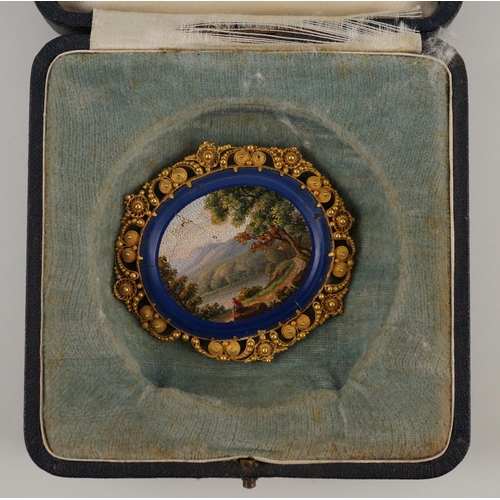 402 - A 19th century Italian gold mounted micro-mosaic oval brooch, depicting a countryside scene, 54mm, g... 