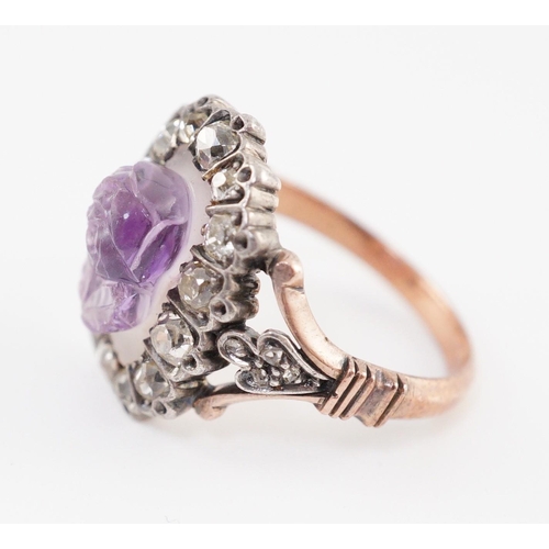 404 - A 19th century gold, carved amethyst and diamond cluster set dress ring, the stone carved with a ros... 