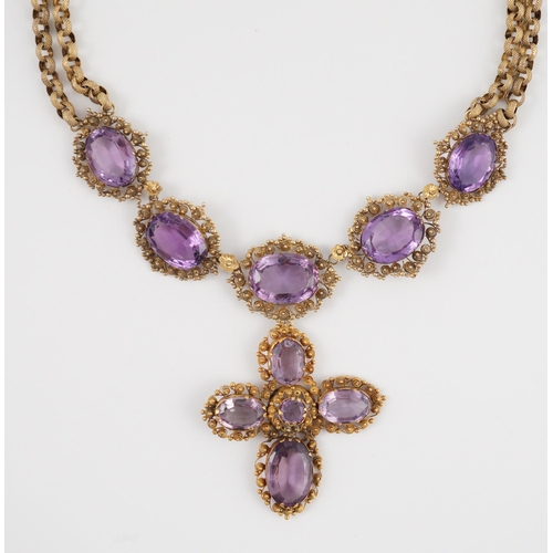 405 - An early 19th century gold and eleven stone oval cut amethyst set pendant necklace and a similar cro... 