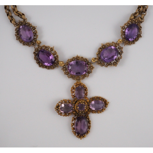 405 - An early 19th century gold and eleven stone oval cut amethyst set pendant necklace and a similar cro... 