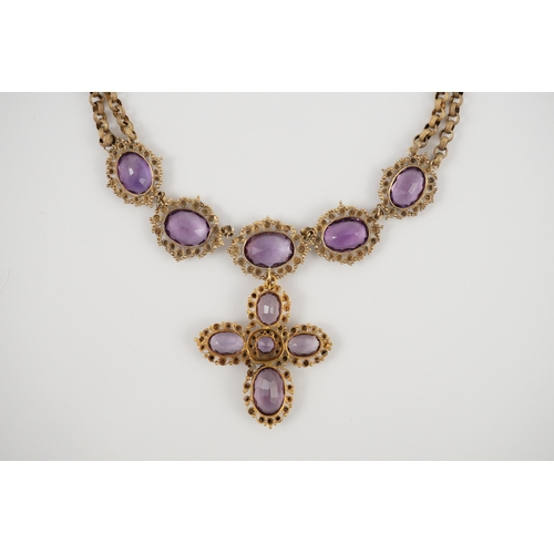 405 - An early 19th century gold and eleven stone oval cut amethyst set pendant necklace and a similar cro... 