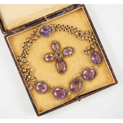 405 - An early 19th century gold and eleven stone oval cut amethyst set pendant necklace and a similar cro... 