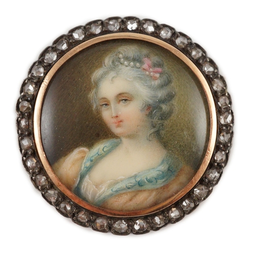 406 - An Edwardian diamond set circular gold brooch with inset miniature portrait bust of a lady, 29mm gro... 