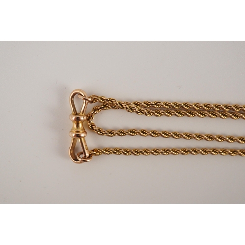 409 - An early 20th century 15ct gold rope twist guard chain, 146cm, 33.5 grams.