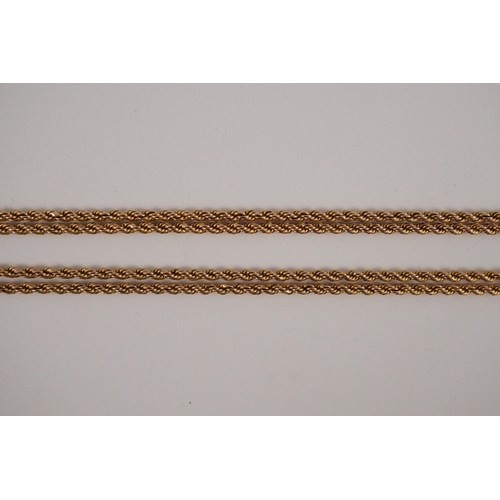 409 - An early 20th century 15ct gold rope twist guard chain, 146cm, 33.5 grams.