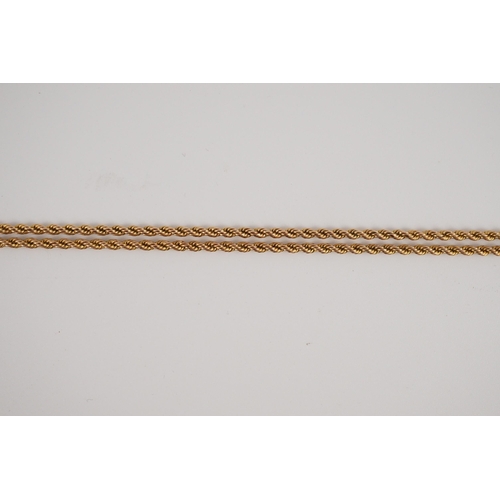 409 - An early 20th century 15ct gold rope twist guard chain, 146cm, 33.5 grams.