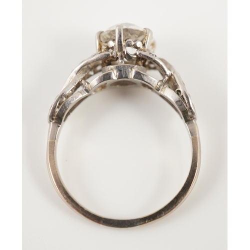 415 - A mid 20th century white gold and single stone diamond ring, with diamond set crossover shoulders, t... 