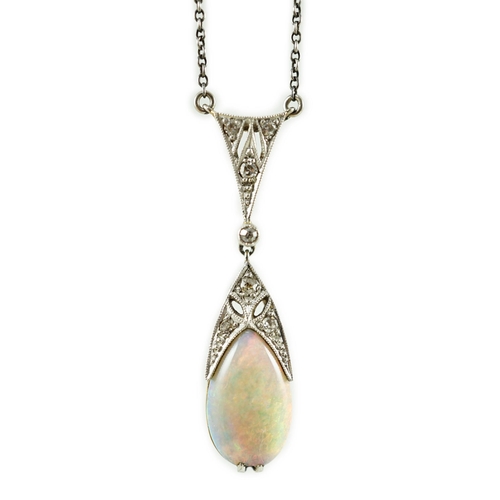 416 - A 1920's gold and platinum, white opal and millegrain set diamond cluster pear shaped drop pendant n... 