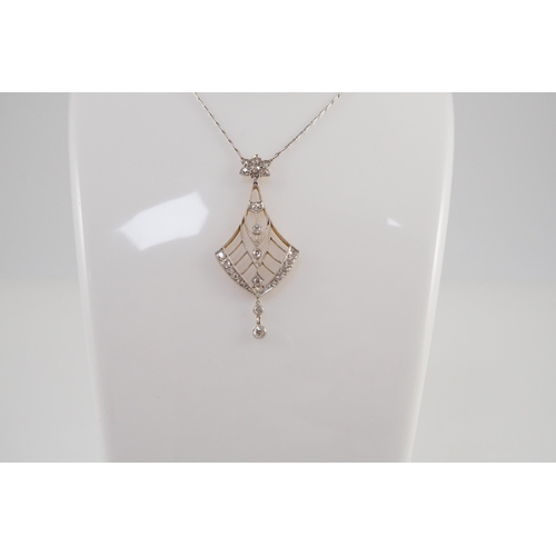 418 - An early to mid 20th century pierced platinum, gold and millegrain set diamond cluster drop pendant,... 