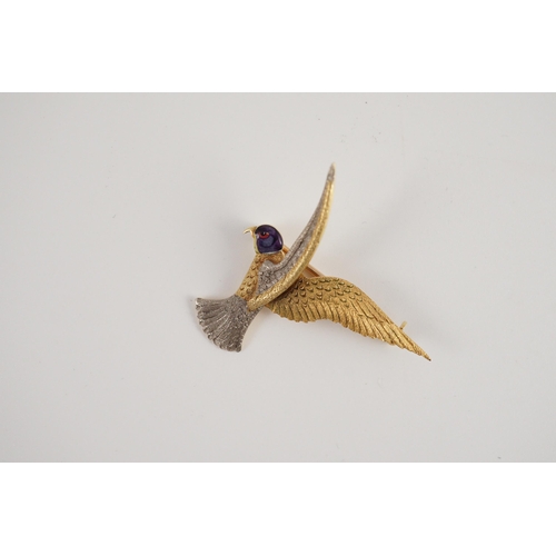 429 - An early 20th century two colour 18ct gold, 15ct gold and enamel set brooch, modelled as a bird of p... 