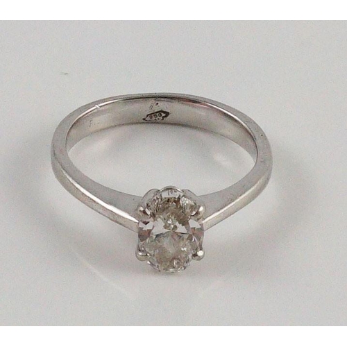 437 - A modern platinum and solitaire oval cut diamond set ring, with a G.H. Pressley & Son insurance valu... 